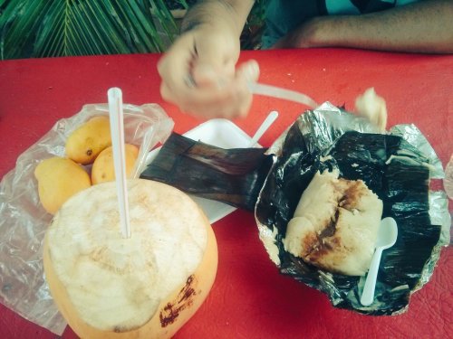 Island food: mangoes, coconut, tamales